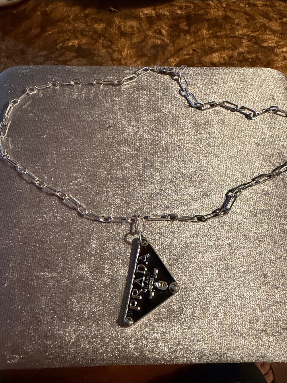Silver and Black Triangle Logo Pendant Necklace